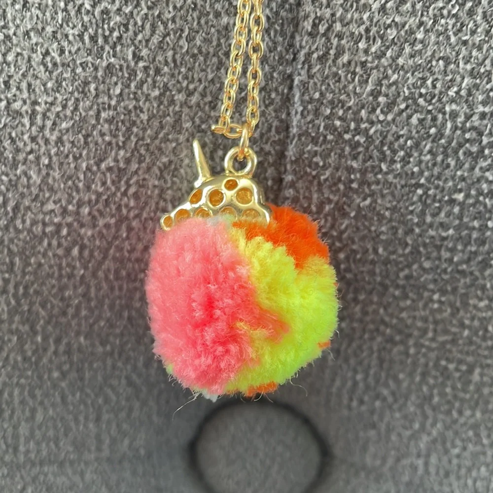 Claire’s Rainbow Unicorn PomPom Necklace